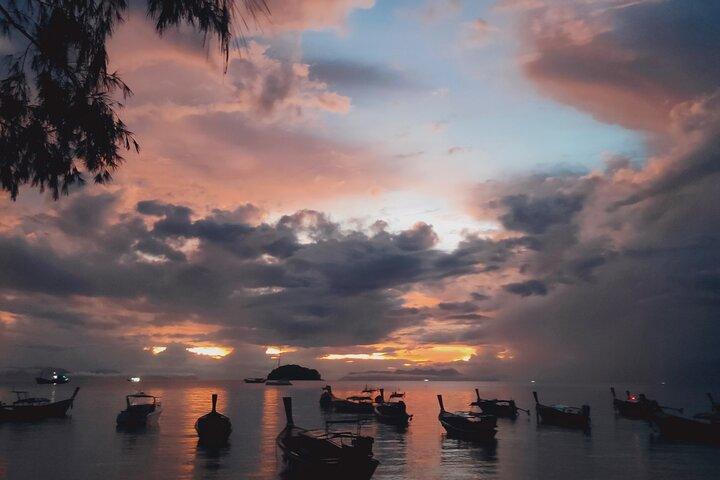 Sunrise yoga class overlooking the beach, sea and sunrise 